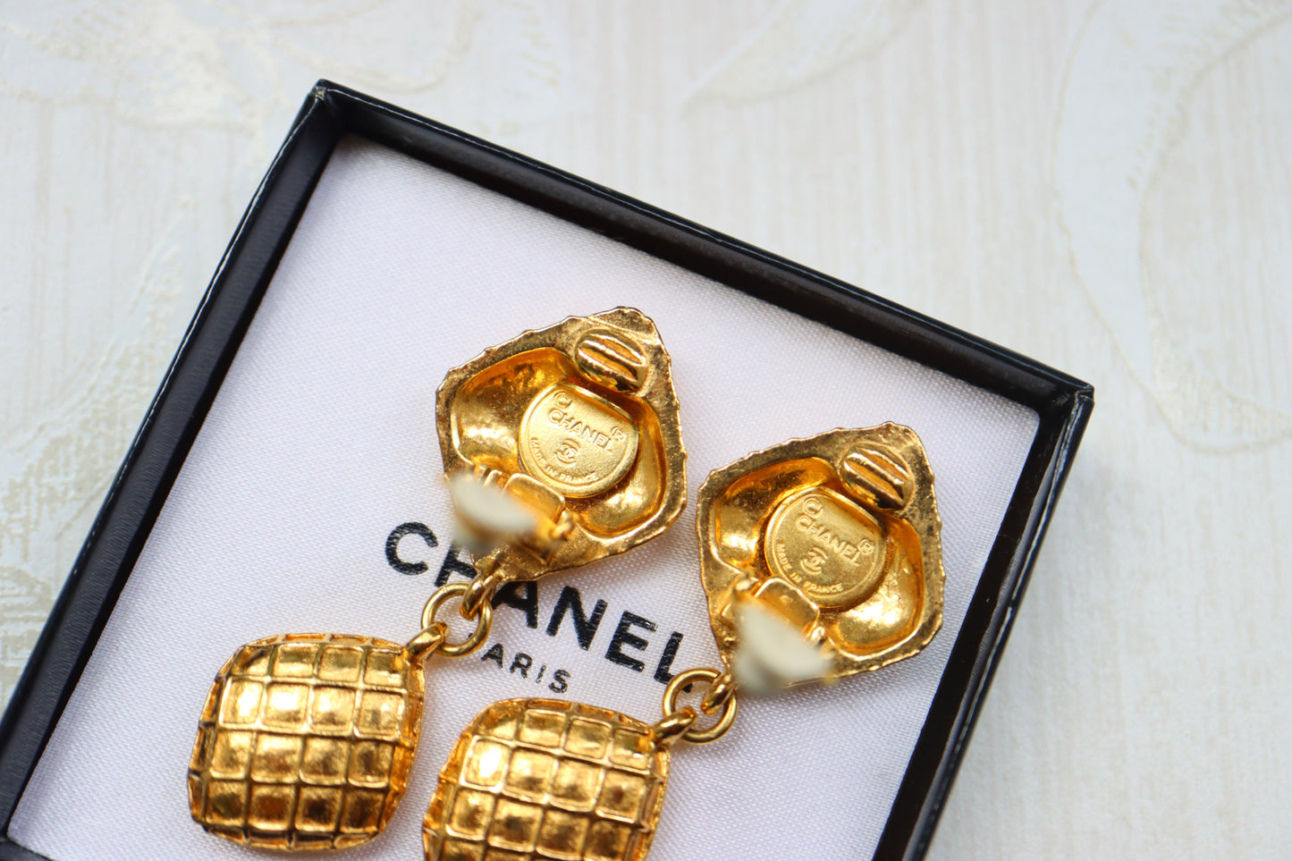 Vintage Chanel 1970s gold tone quilted drop rhinestone clip on earrings