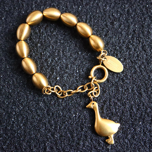 Vintage Moschino cheap & chic golden goose eggs bracelet