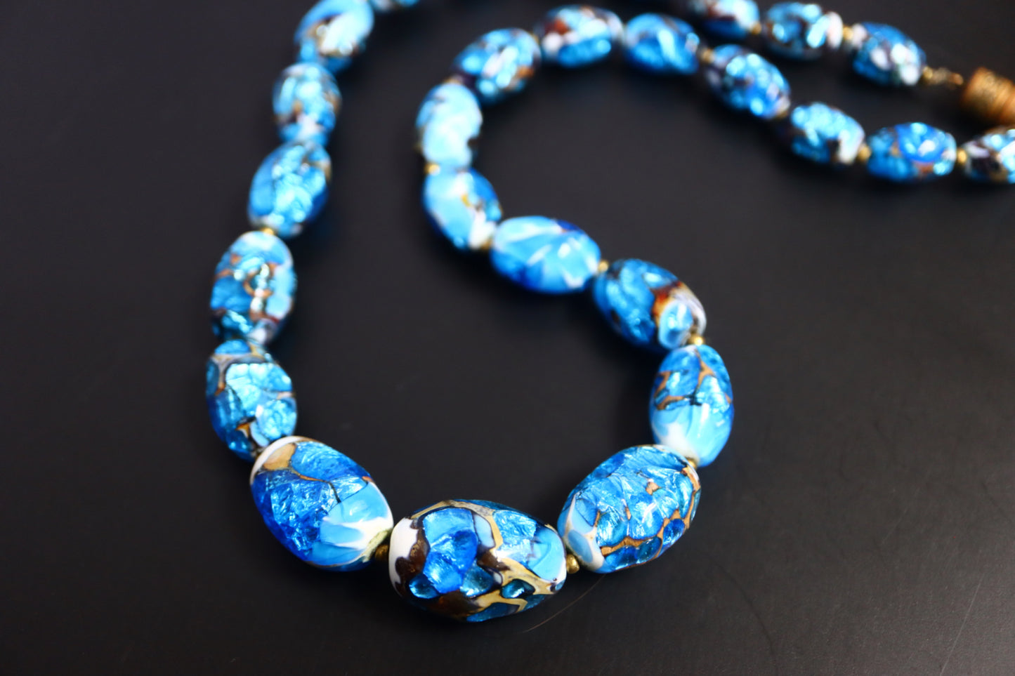 Vintage foiled blue glass bead necklace and Limoges enamel clip-on earrings set