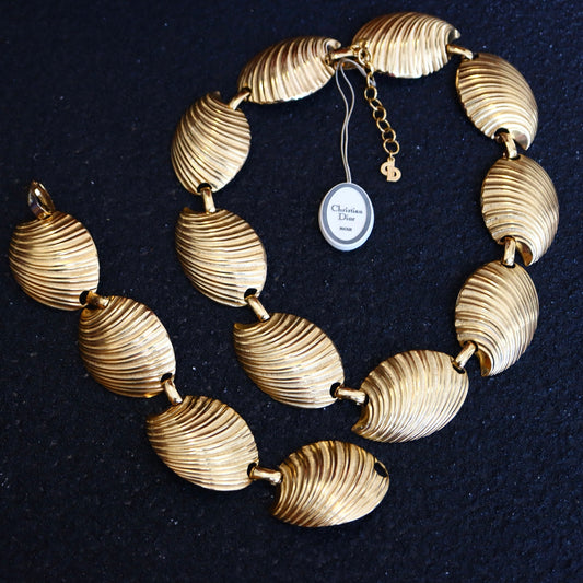 Vintage Christian Dior gold tone shell pattern necklace and bracelet set