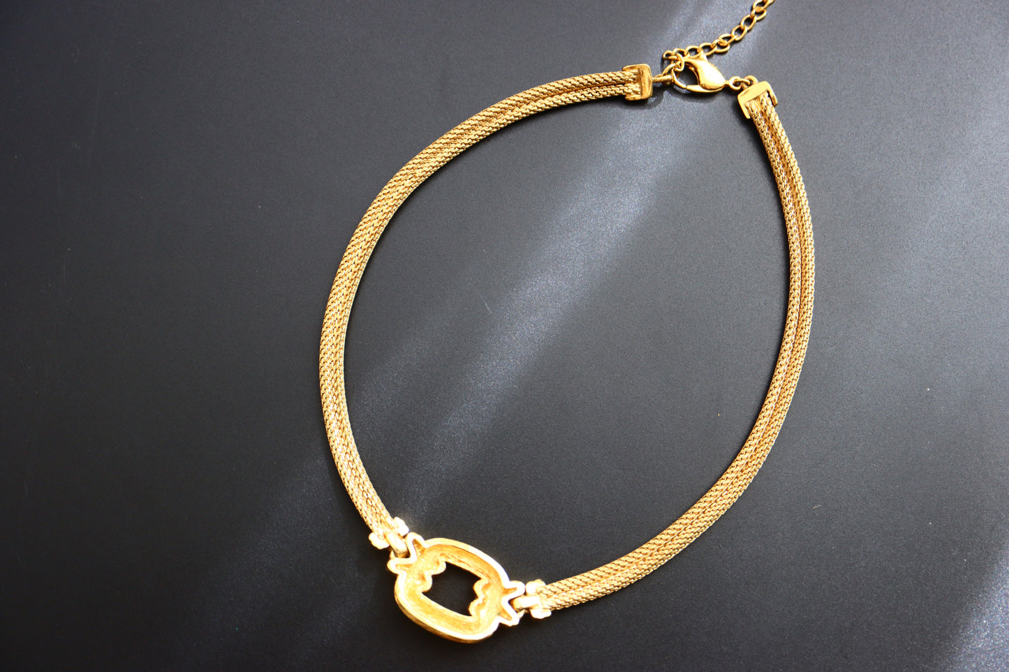 Vintage Christian Dior gold-tone weaving cross necklace